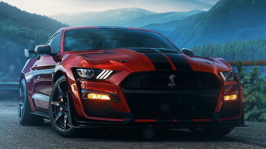 Red Ford Mustang Shelby GT500 with Black Stripes on Mountain Road HD wallpaper