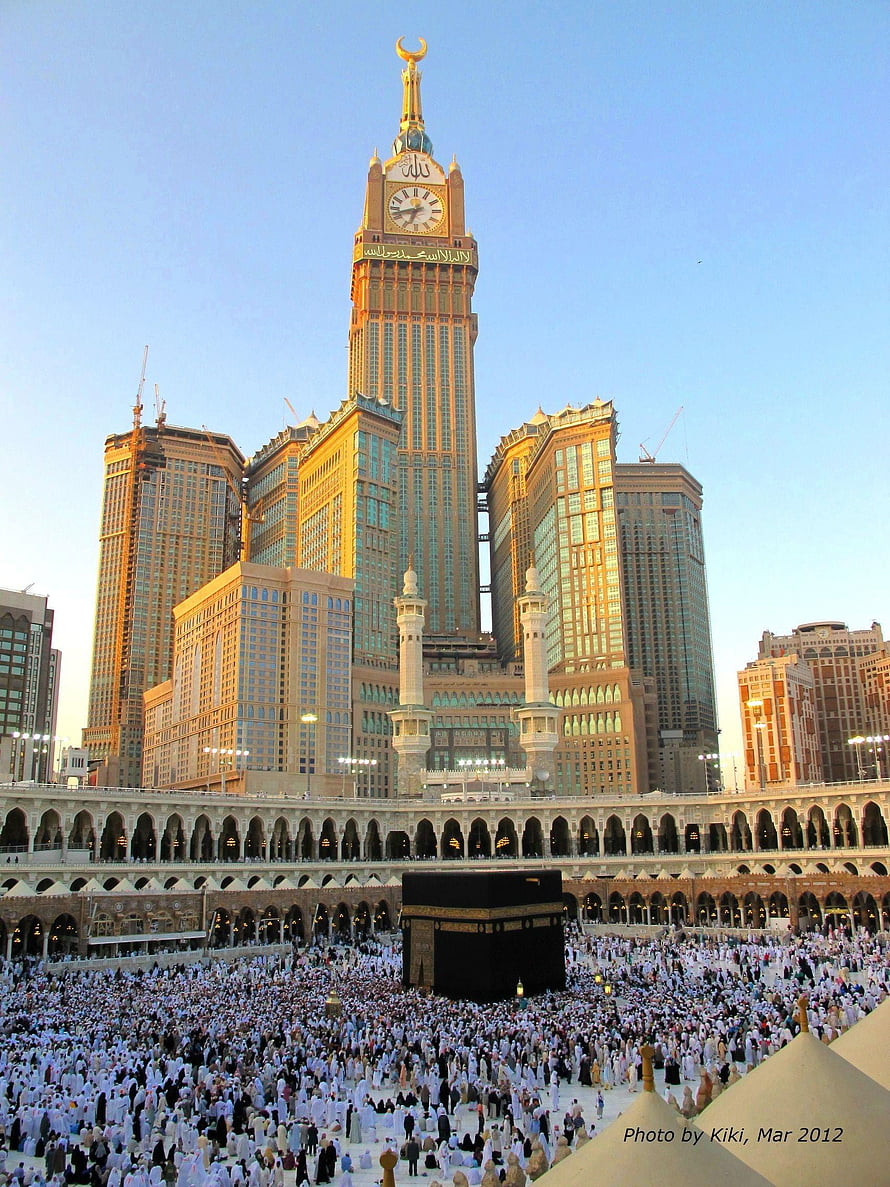 Kaaba and Abraj Al Bait Clock Tower in Mecca with Pilgrims HD phone wallpaper
