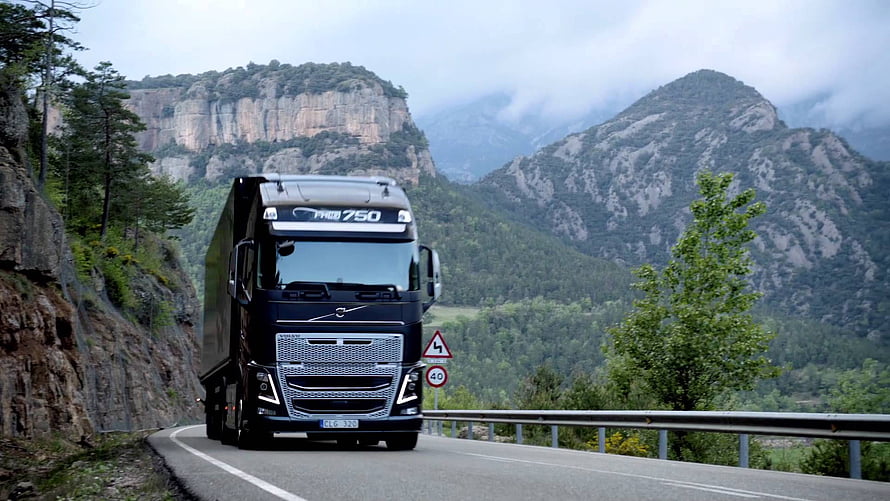 Volvo FH16 750 Heavy Duty Truck Driving on Scenic Mountain Road HD wallpaper