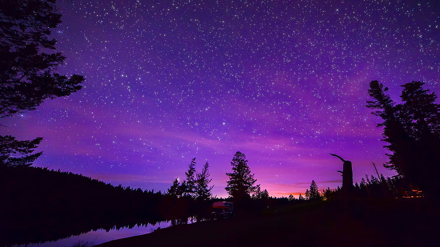 Purple Starry Night Sky Over Lake With Silhouetted Trees And Campervan HD wallpaper