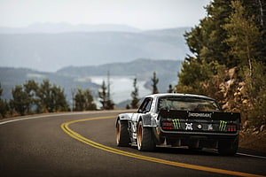 Hoonicorn V2 Hoonigan Ford Mustang on a Scenic Mountain Road HD wallpaper