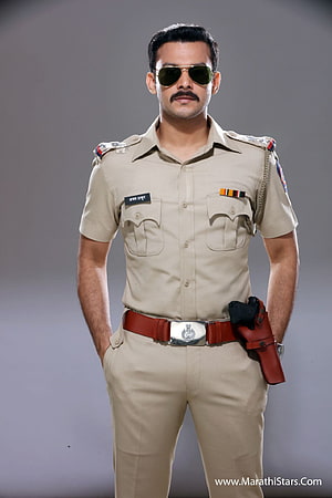 Indian Police Officer in Khaki Uniform with Aviator Sunglasses and Duty Belt HD phone wallpaper