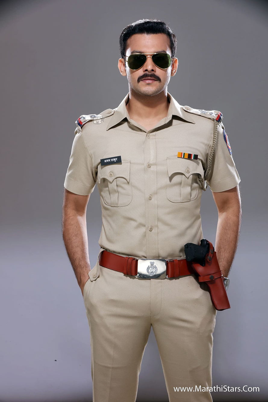 Indian Police Officer in Khaki Uniform with Aviator Sunglasses and Duty Belt HD phone wallpaper