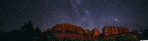 Meteor Shower Over Red Rock Canyon Under the Milky Way HD wallpaper