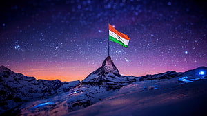 Indian Flag on Snowy Mountain Peak Under Starry Night Sky HD wallpaper