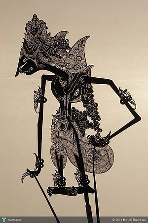 Intricate Black Silhouette of Traditional Indonesian Wayang Kulit Shadow Puppet HD phone wallpaper