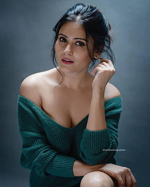 Archana Gupta in a Green Off-Shoulder Sweater Portrait HD phone wallpaper