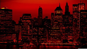 Dramatic Red Tinted Manhattan Skyline at Night with Glowing City Lights HD wallpaper