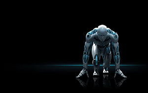 Futuristic cyborg athlete in starting blocks pose with glowing blue lights on black background HD wallpaper