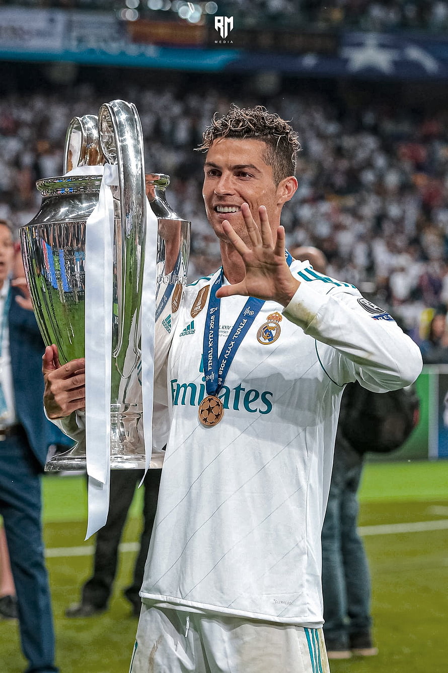 Cristiano Ronaldo Celebrating With The Champions League Trophy In Real Madrid Kit HD phone wallpaper