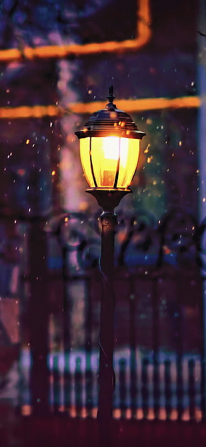 Vintage Street Lamp Glowing Warmly in a Magical Night Scene with Bokeh Lights HD phone wallpaper