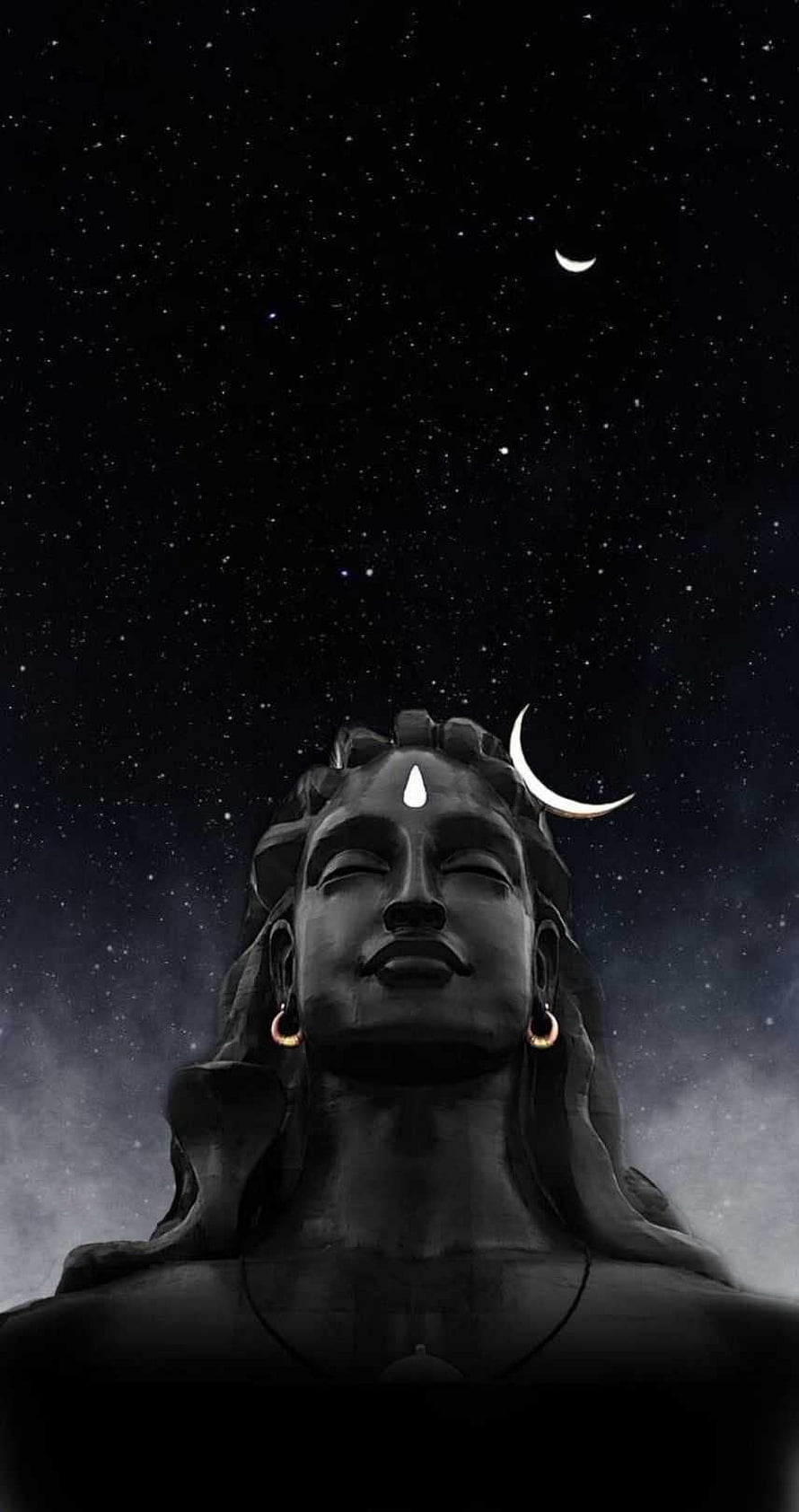 Statue of Lord Shiva with Crescent Moon and Third Eye Against Starry Night Sky HD phone wallpaper