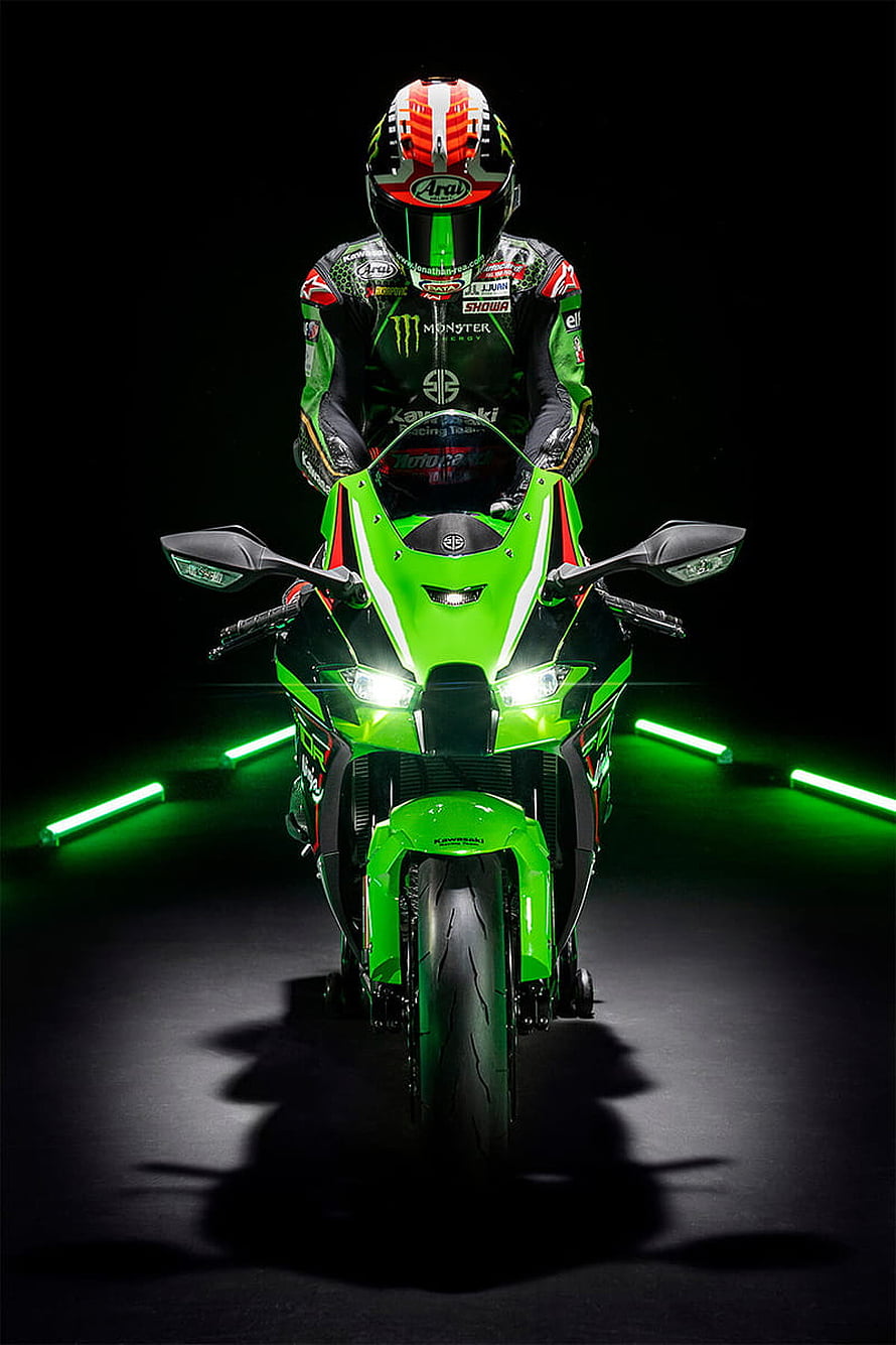 Kawasaki Ninja ZX-10R with Rider in Racing Gear and Neon Lights HD phone wallpaper