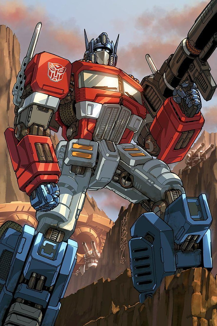 Optimus Prime Comic Artwork Standing in Desert Canyon with Cannon HD phone wallpaper