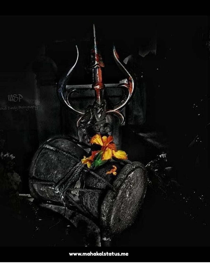 Bhole Baba Shiva Statue with Trishul and Marigold Garland in Dark Setting HD phone wallpaper