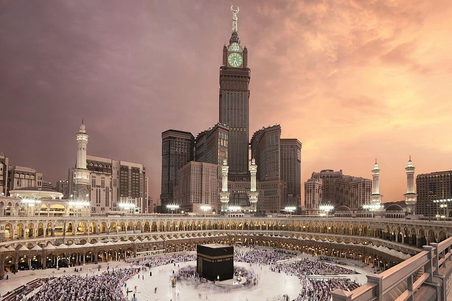 Majestic View of the Kaaba and Abraj Al Bait Clock Tower in Mecca at Sunset HD wallpaper