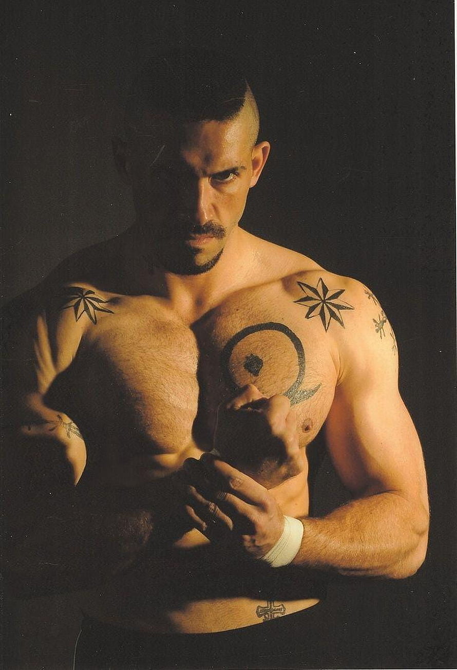 Yuri Boyka shirtless portrait with chest and shoulder tattoos in dramatic low-key lighting HD phone wallpaper