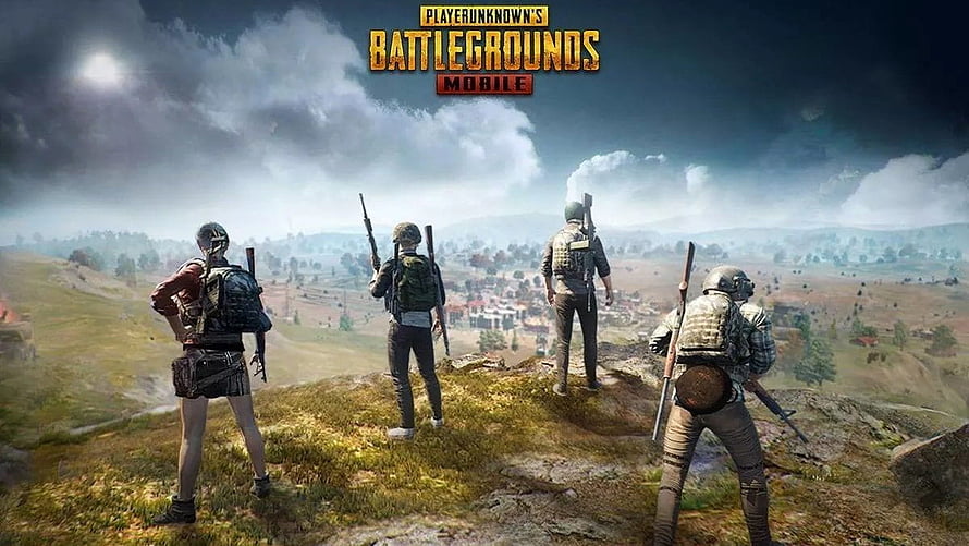 PUBG Mobile Squad on Hilltop Overlooking Village Under Stormy Sky HD wallpaper