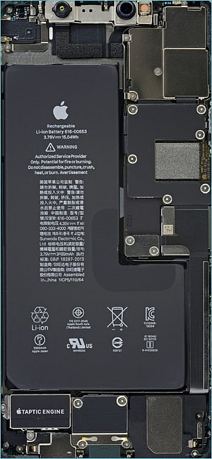 Internal view of iPhone 11 Pro Max showing Li-ion battery, Taptic Engine, and logic board components HD phone wallpaper
