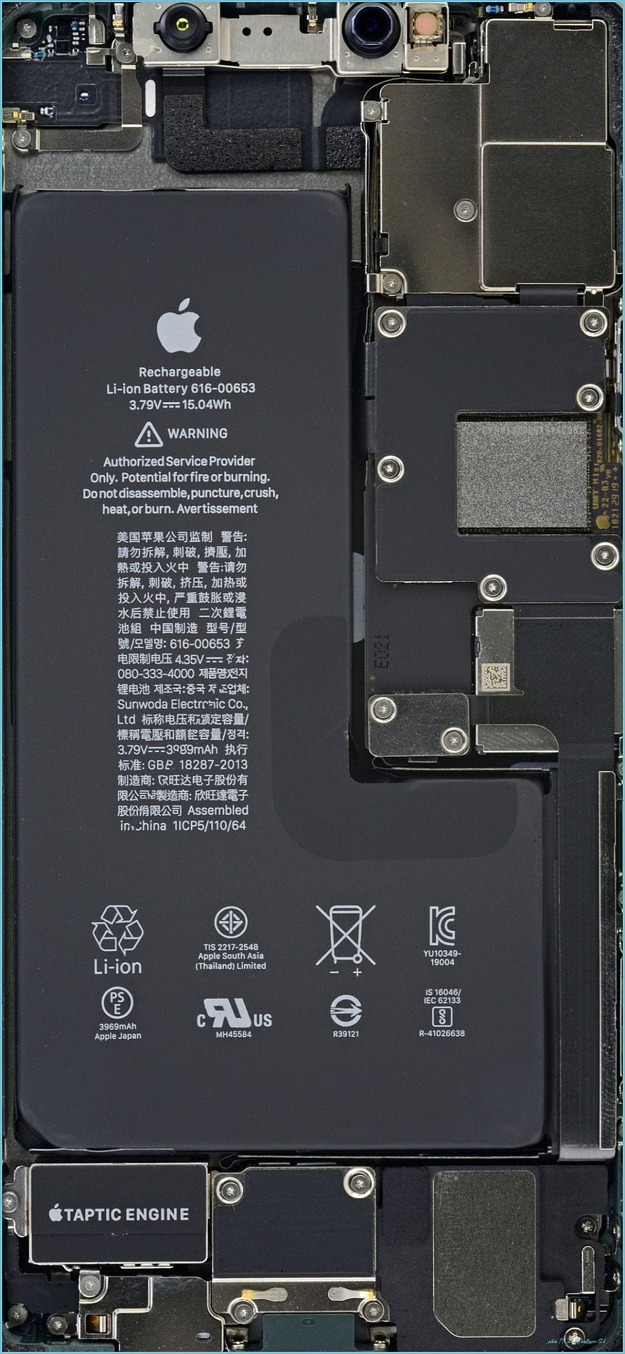 Internal view of iPhone 11 Pro Max showing Li-ion battery, Taptic Engine, and logic board components HD phone wallpaper