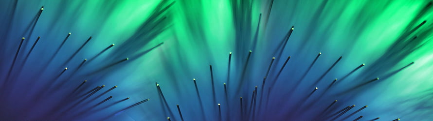 Abstract Fiber Optic Light Strands Against Vibrant Green and Blue Gradient Background HD wallpaper