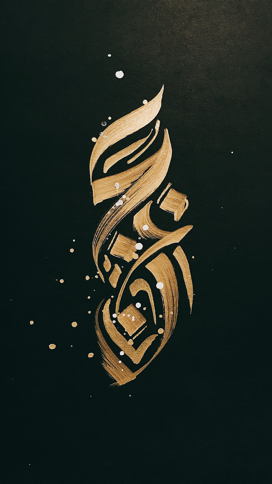 Elegant Gold Arabic Calligraphy Art on Dark Background with White Splatter Accents HD phone wallpaper