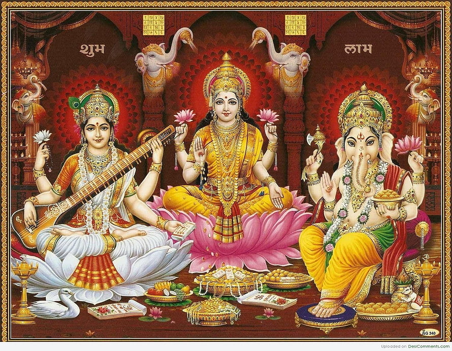 Traditional Indian Pooja Thali Depicting Goddess Lakshmi, Saraswati, and Ganesha HD wallpaper