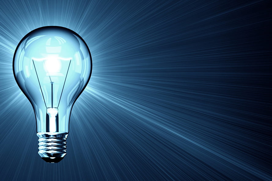 Glowing Light Bulb With Radiant Blue Rays On Dark Background HD wallpaper