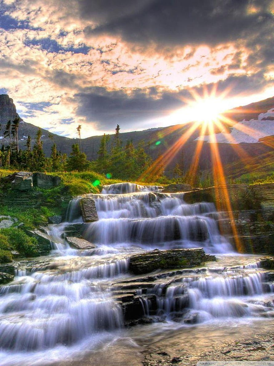 Sunburst Over Mountain Waterfall with Misty Cascades and Pine Forest HD phone wallpaper