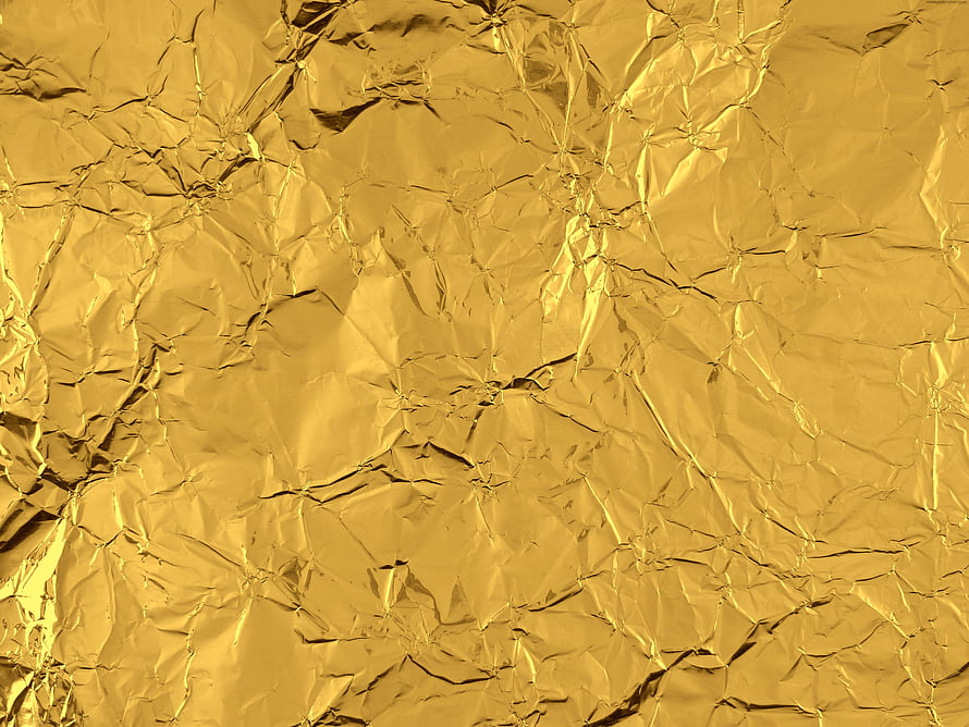 Crumpled Gold Foil Texture with Metallic Sheen and Intricate Creases HD wallpaper