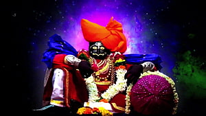 Kaliya Mardan Leela Krishna Idol With Orange Turban And Flower Garland HD wallpaper
