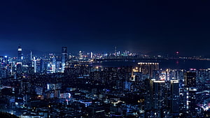 Aerial Night View of Shenzhen Skyline Across the Water HD wallpaper