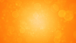 Warm Orange Bokeh Light Flare Abstract Background with Soft Circular Bubbles HD wallpaper