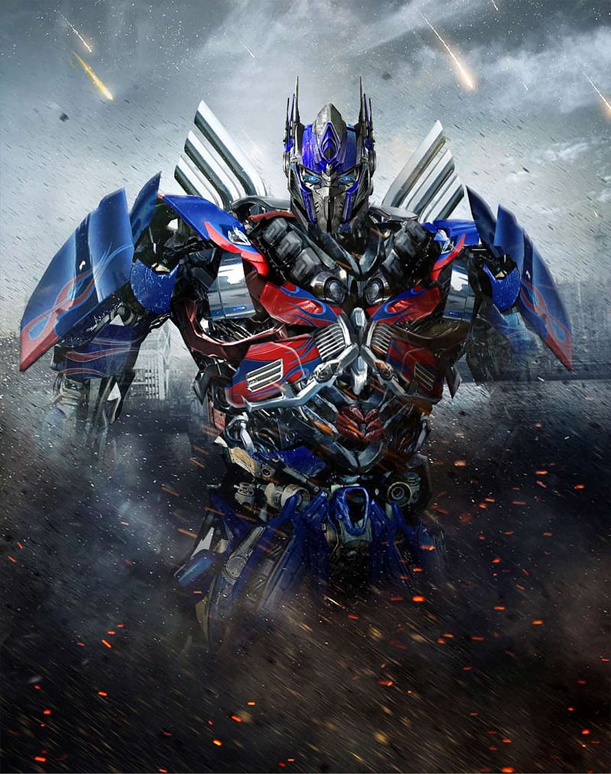 Optimus Prime from Transformers in a Dramatic Battle Scene with Sparks and Smoke HD phone wallpaper