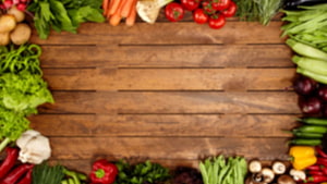 Fresh Vegetable Border on Rustic Wooden Table with Central Copy Space HD wallpaper