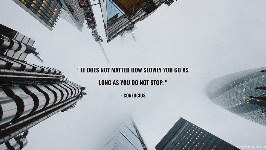 Confucius motivational quote about perseverance on a background of towering skyscrapers HD wallpaper