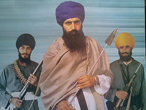 Sardar Singh Bhangu from the movie Sholay with two companions holding weapons HD wallpaper