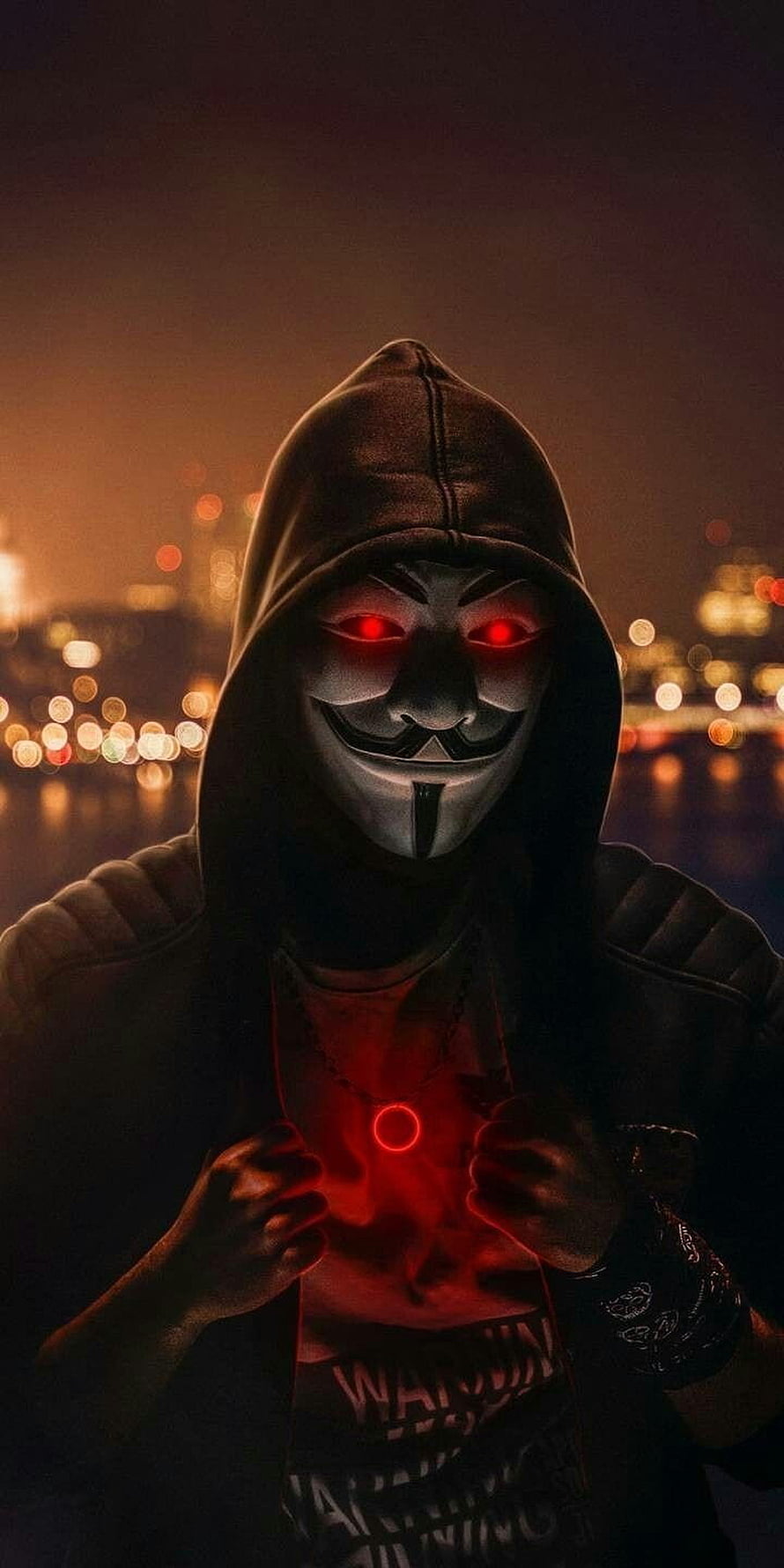 Anonymous Hacker in Hoodie with Glowing Red Eyes and City Bokeh Background HD phone wallpaper