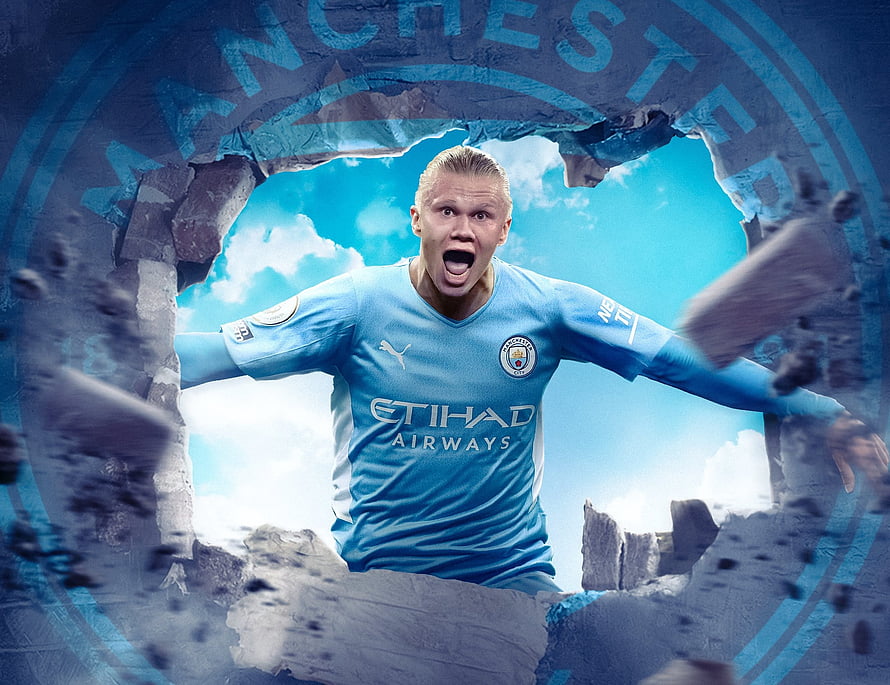 Erling Haaland Breaking Through Manchester City Crest in Sky Blue Kit HD wallpaper