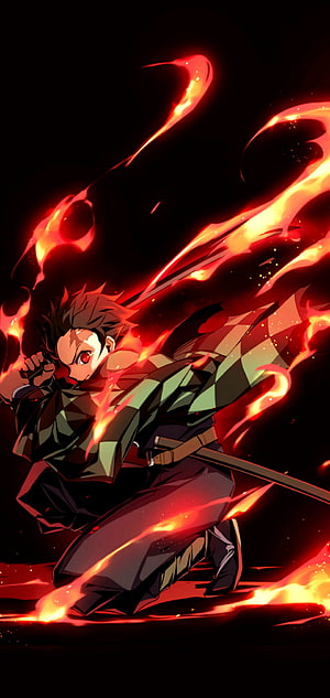 Tanjiro Kamado wielding his sword surrounded by intense red flames in a dynamic battle pose HD phone wallpaper