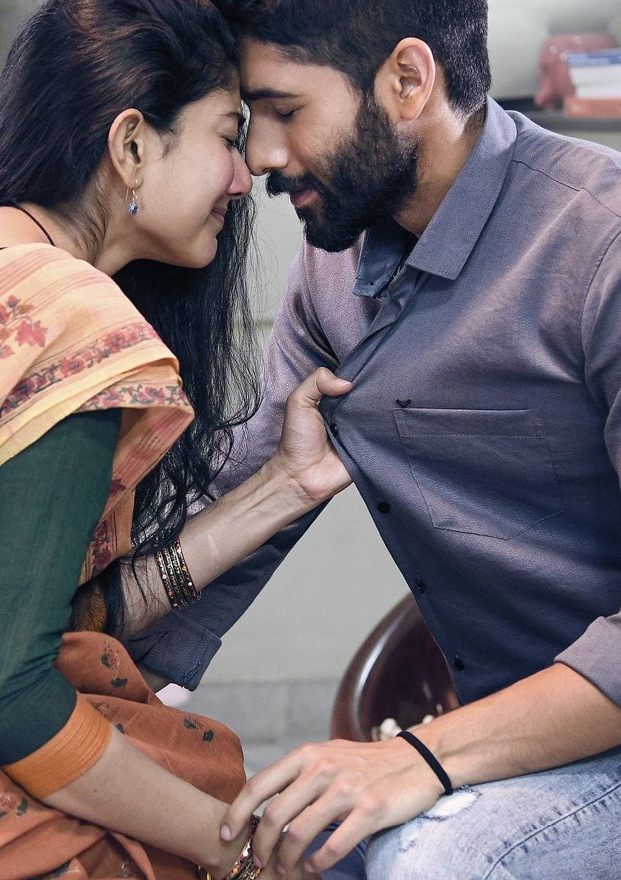 Naga Chaitanya and Sai Pallavi in an intimate emotional moment from Love Story HD phone wallpaper