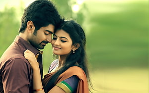 Romantic Indian Couple Embracing in a Lush Green Park with Soft Focus Background, Couple Tamil Hero Heroine Love, south actress couple HD wallpaper