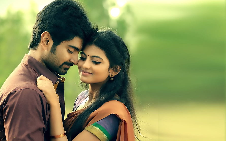 Romantic Indian Couple Embracing in a Lush Green Park with Soft Focus Background, Couple Tamil Hero Heroine Love, south actress couple HD wallpaper