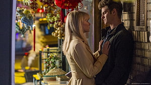 Peter Parker and Gwen Stacy in an intimate moment outside a shop with festive decorations HD wallpaper