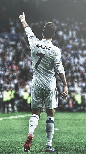 Cristiano Ronaldo in Real Madrid White Kit Pointing Up on the Pitch HD phone wallpaper