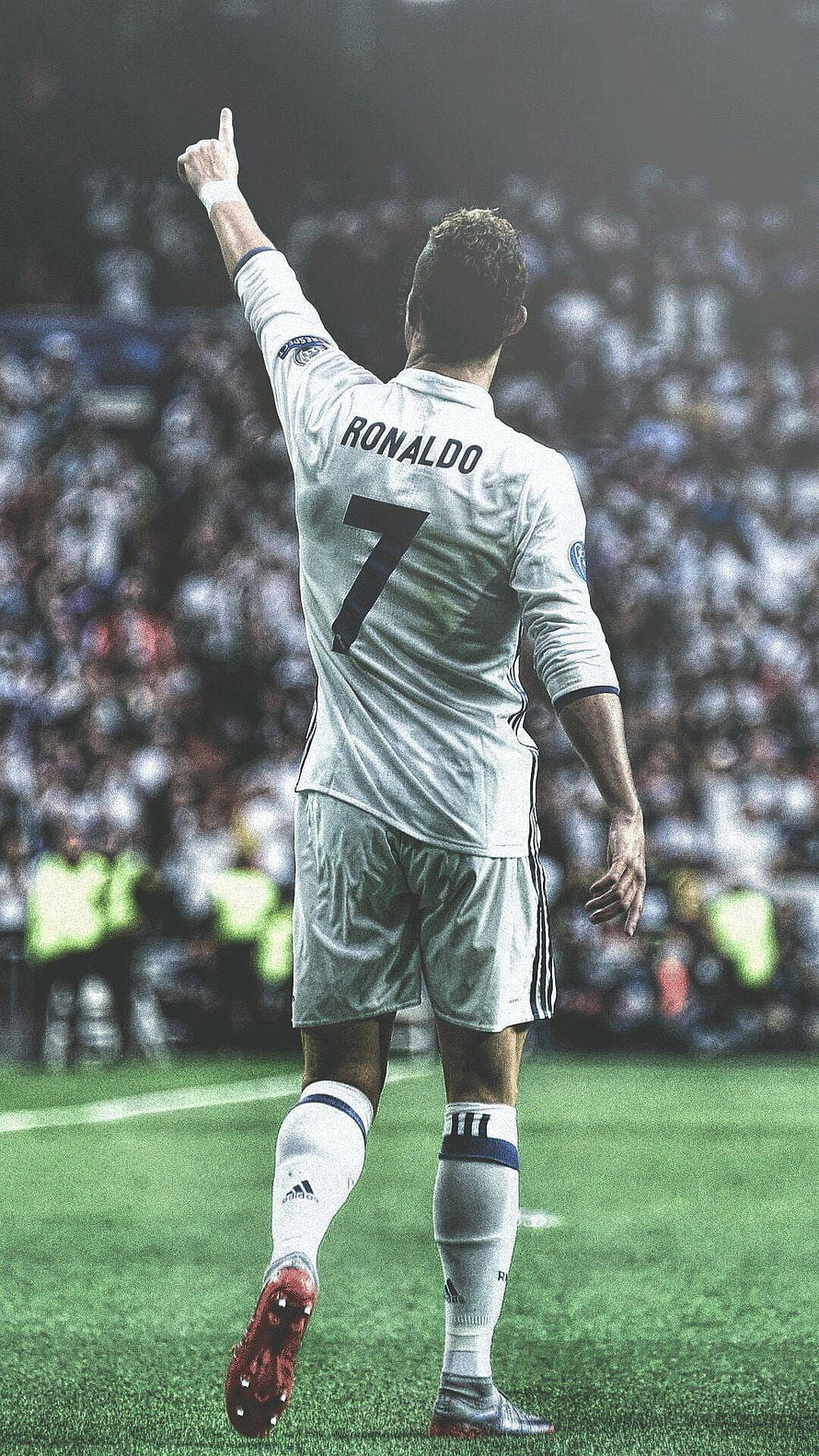 Cristiano Ronaldo in Real Madrid White Kit Pointing Up on the Pitch HD phone wallpaper