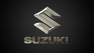 Suzuki Metallic Logo on Dark Carbon Fiber Background HD wallpaper