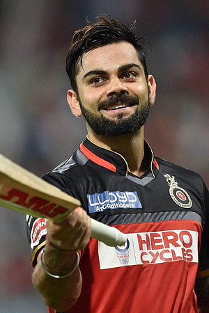 Virat Kohli Smiling Portrait in Royal Challengers Bangalore Cricket Jersey HD phone wallpaper
