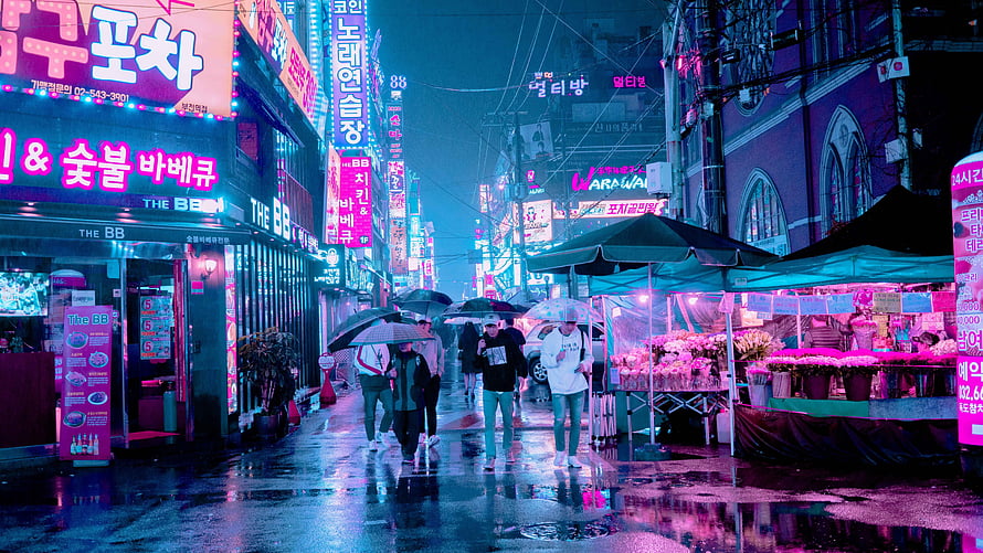 Rainy Night in Seoul's Neon-Lit Street with Pedestrians and Market Stalls HD wallpaper