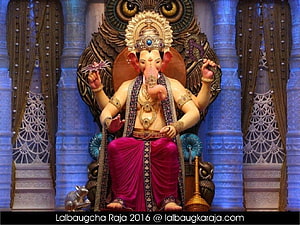 Lalbaugcha Raja Ganesha Murti with Ornate Crown and Pink Dhoti HD wallpaper